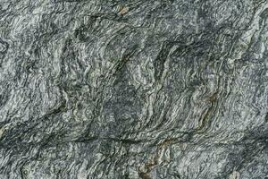 el rocoso textura de un antiguo mar Roca. foto