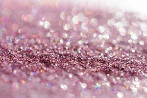 Abstract sequin background with shining festive bokeh. photo