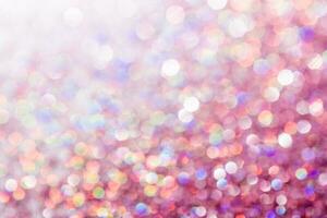 Abstract sequin background with shining festive bokeh. photo