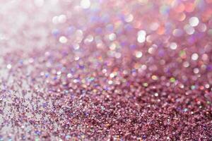 Abstract sequin background with shining festive bokeh. photo