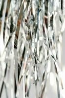 Abstract atmospheric background of tinsel with bokeh. photo