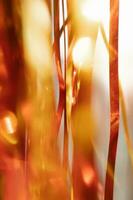 Abstract atmospheric background of tinsel with bokeh. photo