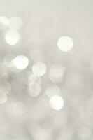 Abstract white and silver background with bokeh. photo