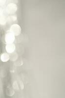 Abstract white and silver background with bokeh. photo
