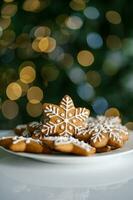 Ginger Christmas cookies on the background of a Christmas tree with lights. photo