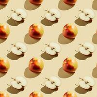 Pattern of apples on a beige background. photo