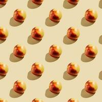 Pattern of apples on a beige background. photo