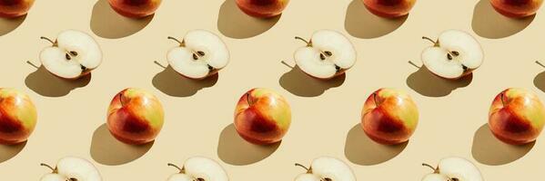 Pattern of apples on a beige background. photo