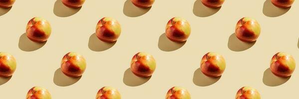 Pattern of apples on a beige background. photo