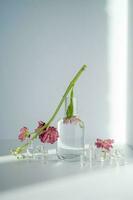 Beautiful abstract background with flowers and vases. photo