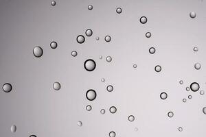 Drops of water on a transparent gray background. photo