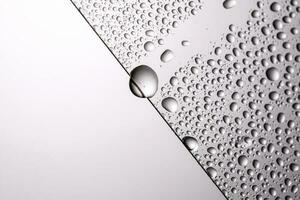 Drops of water on a transparent gray background. photo