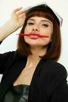 photo pretty woman short haired red notepad and pencil Lifestyle unaltered