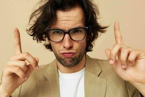 man with glasses emotions gesture hands posing isolated background photo