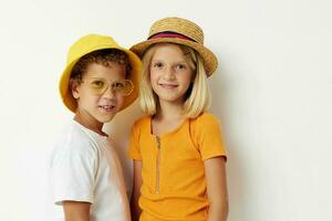 boy and girl wearing hats with phone fashion posing childhood photo