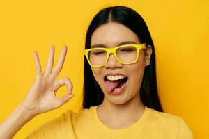 pretty brunette in glasses gesturing with hands copy-space isolated background unaltered photo