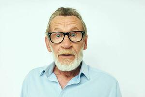 Photo of retired old man in shirt and glasses posing emotions isolated background