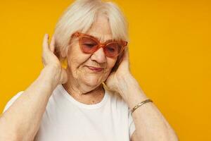 Photo of retired old lady health lifestyle eyeglasses isolated background