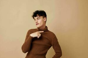 Photo young boyfriend stylish hairstyle brown turtleneck Lifestyle unaltered