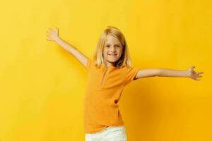 Young blonde girl smile hand gestures posing casual wear fun isolated background unaltered photo