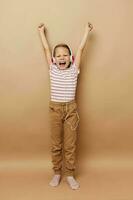 pretty young girl in striped t-shirt headphones gesture hands childhood unaltered photo