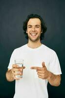 Attractive man transparent glass of water health isolated background photo