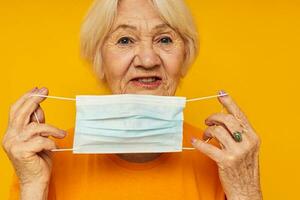 Photo of retired old lady happy lifestyle medical mask isolated background