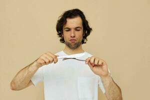 Cheerful man emotions knife and fork kitchenware isolated background photo