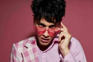 pretty man pink shirt and glasses jacket fashion elegant style isolated background unaltered photo