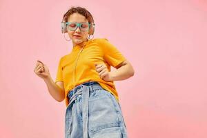 cheerful woman wearing headphones blue glasses close-up emotions cropped view unaltered photo