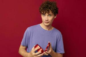 funny red-haired guy with curly hair a gift like a heart photo