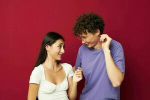 nice guy and girl hand gesture fun friendship red background photo