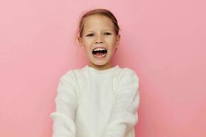 little girl white sweater posing fun isolated background photo