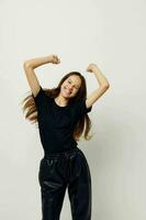 young beautiful woman in a black t-shirt hand gesture fun Lifestyle unaltered photo