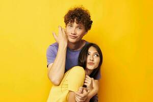 cute young couple Friendship posing fun studio isolated background unaltered photo