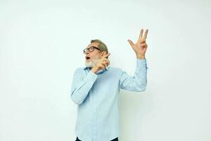 elderly man in shirt and glasses posing emotions isolated background photo