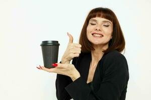 attractive woman in a suit glass of coffee posing isolated background photo