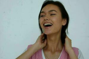 short haired woman in pink vest studio fashion photo