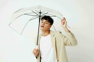 Man transparent umbrella a man in a light jacket Lifestyle unaltered photo