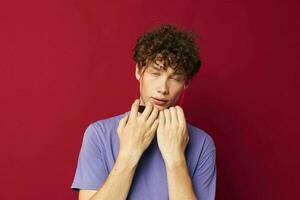 cute guy in purple t-shirt hat birthday party fun photo