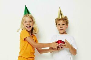 girl giving a gift to a boy birthday surprise photo