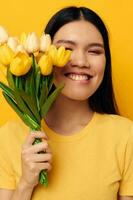 pretty brunette with a bouquet of yellow flowers romance studio model unaltered photo