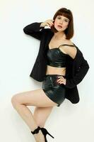 attractive woman in leather skirts posing glamor sexy Lifestyle unaltered photo