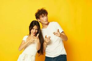 portrait of a man and a woman posing together in white t-shirts friendship Lifestyle unaltered photo