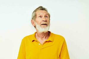 Senior grey-haired man with a gray beard emotion gestures hands cropped view photo