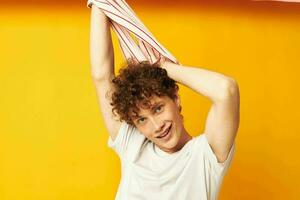 guy with red curly hair striped t shirt posing summer clothing isolated background unaltered photo