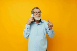 old man talking on the phone posing close-up unaltered photo