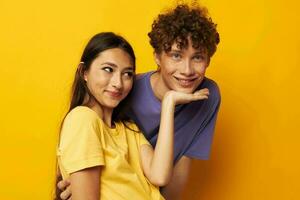 teenagers Friendship posing fun studio yellow background unaltered photo