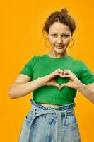 cheerful pretty girl in summer clothes posing yellow background photo