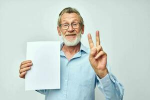 old man office documents work light background photo